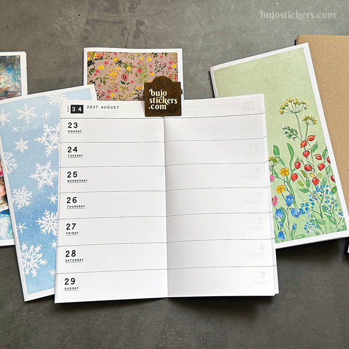 Dated Traveler's notebook in 8 languages • Regular size • Weekly horizontal calendar • Custom options • A02